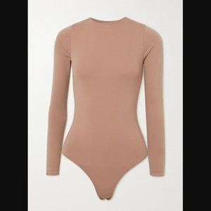 SKIMS Essential Crew Neck Long Sleeve Bodysuit in Tigers Eye